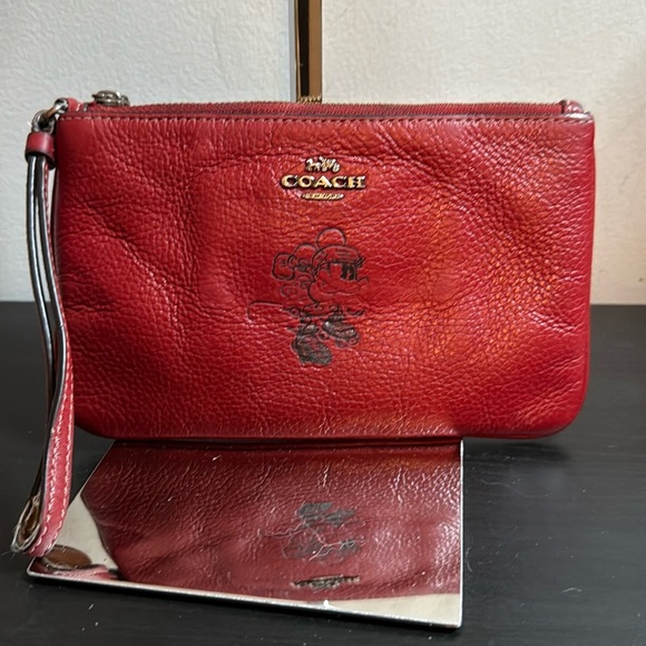 Coach Handbags - Coach x Disney Minnie Mouse pebbled leather wristlet